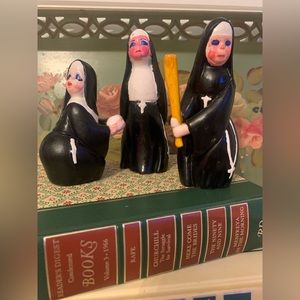 Vintage nun trio playing baseball